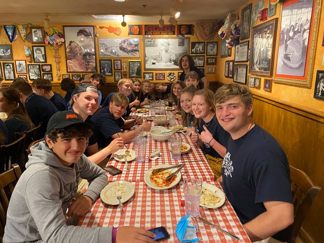 Student group enjoying dinner on tour