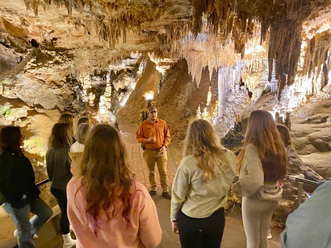 Kids exploring caverns 