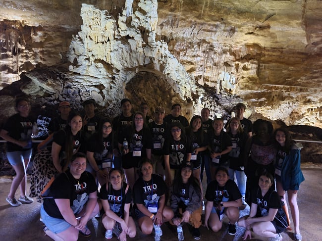 Group exploring cave
